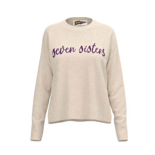 Beige sweater with 'Seven Sisters' text on a white background