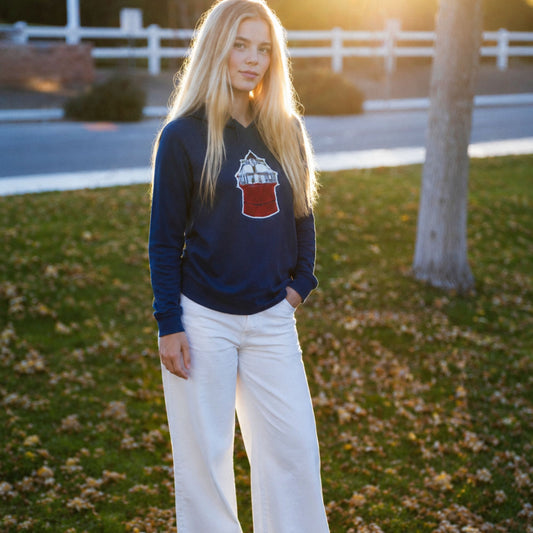 woman outside in navy blue sweater